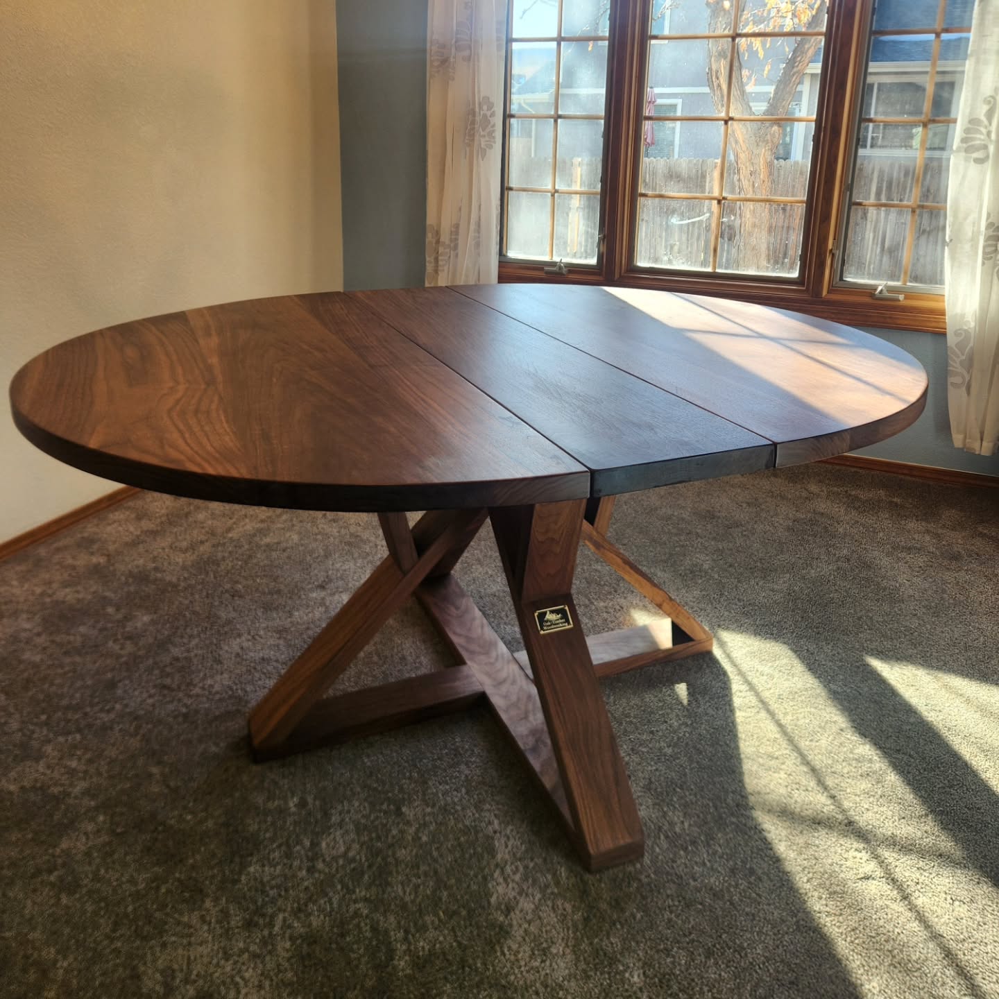 After YEARS of patiently waiting, I finally built my wife, the dining table she's been wanting for a very long time! Good thing I knew a guy who could make her dream table a reality. 
54" round table that extends out to 66" round with the leaf insert. Wood choice was walnut. It's one of my absolute favorite woods for dining tables and projects in general. 
Brand Medallion: @medallionmakerbranding 
Finish: @rubiomonocoatusa 
#customdiningtable #colorado #denver #golden #lakewood #veteranowned #smallbusiness #shopsmall
#buylocal #woodpreneur #woodworking #custom #furniture