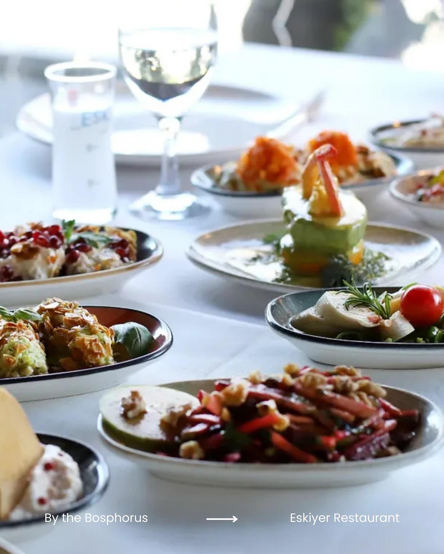 “Rakı and fish” by the Bosphorus—an essential part of Istanbul living.
And at Eskiyer in Yeniköy, this tradition lives on—fully and vibrantly with fresh seafood, shareable mezes, and carefully set tables facing the water.
With its century-old trees, historic mansions, and iconic waterfront homes, Yeniköy is one of the city’s most distinctive and storied neighborhoods—where the elegance of the past meets the rhythm of today.
Right in the heart of it all, Eskiyer isn’t just a stylish restaurant—it’s part of the culture that keeps this ritual alive.
From the serene shores of Bodrum to the timeless charm of Cyprus, the Eskiyer experience resonates across beloved destinations—each one a reflection of our shared philosophy in coastal dining.
We’re also proud to share that Eskiyer has been recognized by Gault & Millau, a testament to our enduring commitment to quality, atmosphere, and culinary authenticity.
Experience this timeless ritual at Eskiyer, set in a historic neighborhood—just moments away from our Avantgarde Urban Hotels.