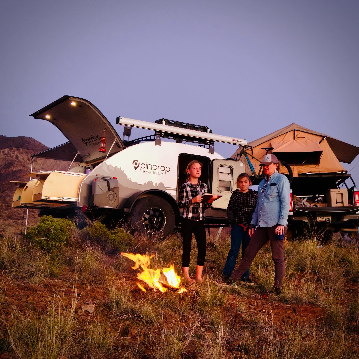 Fiction by the fire. 📖 🔥
.
Keep it real.
.
#madeinusa #pindroptraveltrailers #microcamper #travel #campfire