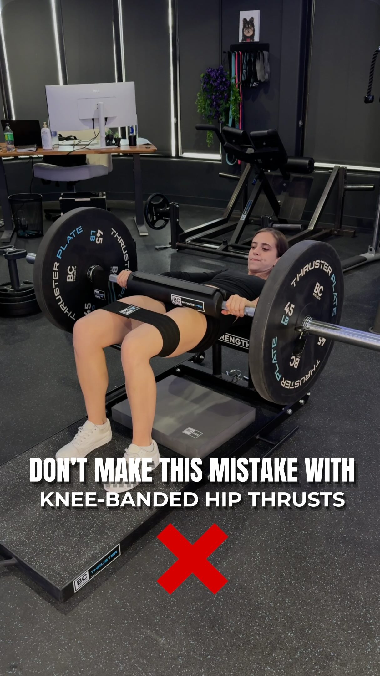 Don’t make this mistake with your knee-banded hip thrusts!
If you’re putting a band above your knees when hip thrusting but not pushing out against the band throughout the set, why even have it on?
Before you even start the set, push out against the band and keep that tension throughout.
Interestingly, wearing a band activates more upper glute max and the same amount of lower glute max, but not more glute medius.
So even though you have to use around 10% lighter loads, you do end up activating the upper glute max even more, without sacrificing any lower glute max activation.
The reason why is that glute activation is really low at the bottom of a hip thrust because the glutes don’t activate very high as hip extensors when in deep hip flexion (in the stretch).
You can also try pushing out even harder on the way down/at the bottom of the rep:
When you push out in deep hip flexion, your glutes activate much higher, indicating that in the stretch position, the CNS decides to activate them to a greater degree as ABDUCTORS than as EXTENSORS. Very interesting aspect of muscle physiology.
So similar stretch but higher glute activation. To @bretcontreras1, that has to equal more growth. But no studies exist so until we have evidence, he thinks it’s smart to do it this way.
Jamie is using a S/M regular Glute Loop above her knees and has the whole Thruster 3.0 set up!